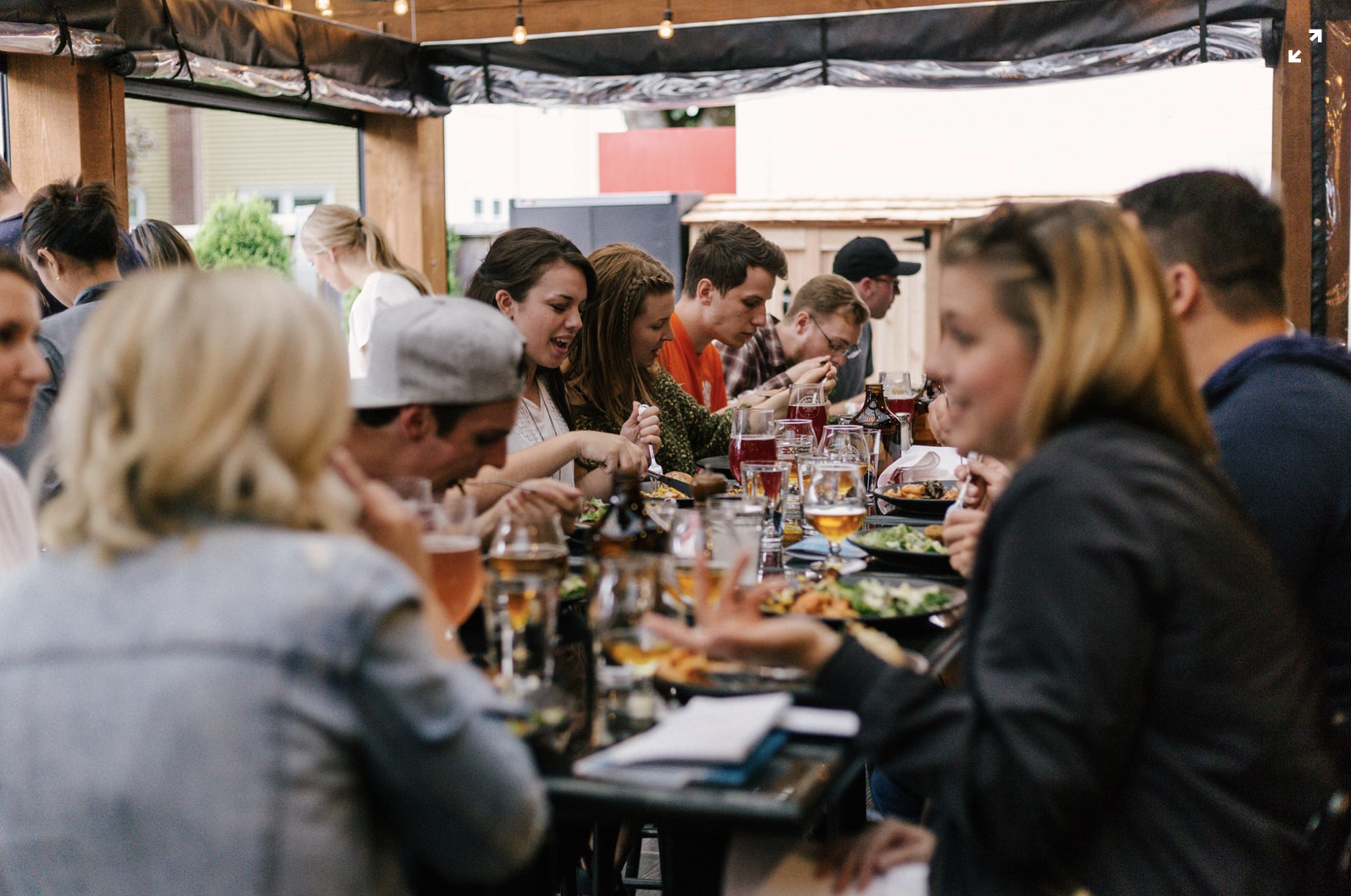 Social gathering for dinner after work. CC: Prisilla Du Preez on Unsplash.