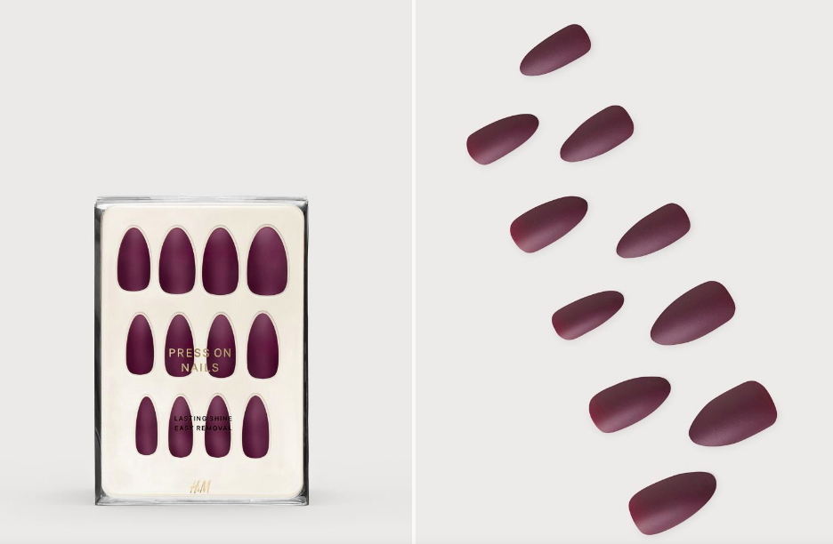A boxed set of matte plum press-on nails beside the same nails laid out loose