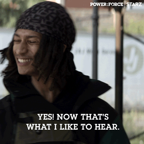 A man in a bandana grins, captioned now that's what I like to hear