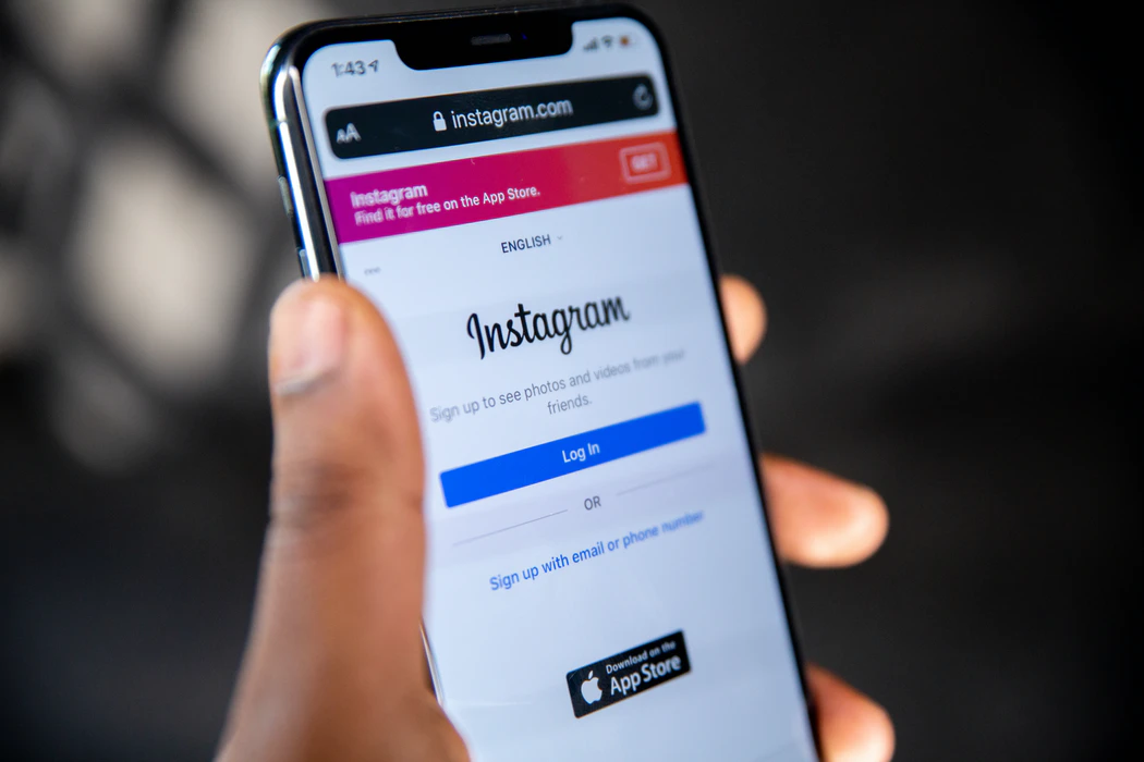 Person looking through Instagram on their phone
